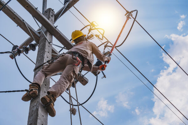 A lineman working on a power line