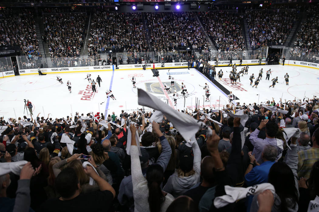 Vegas Golden Knights fans cheering at a hockey game