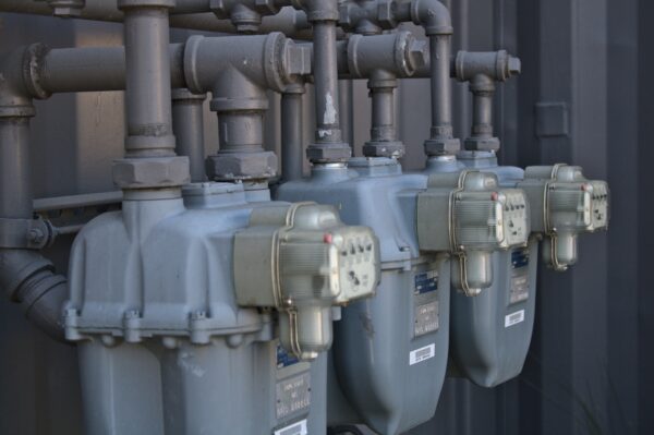 Energy meters lined up on the side of a wall