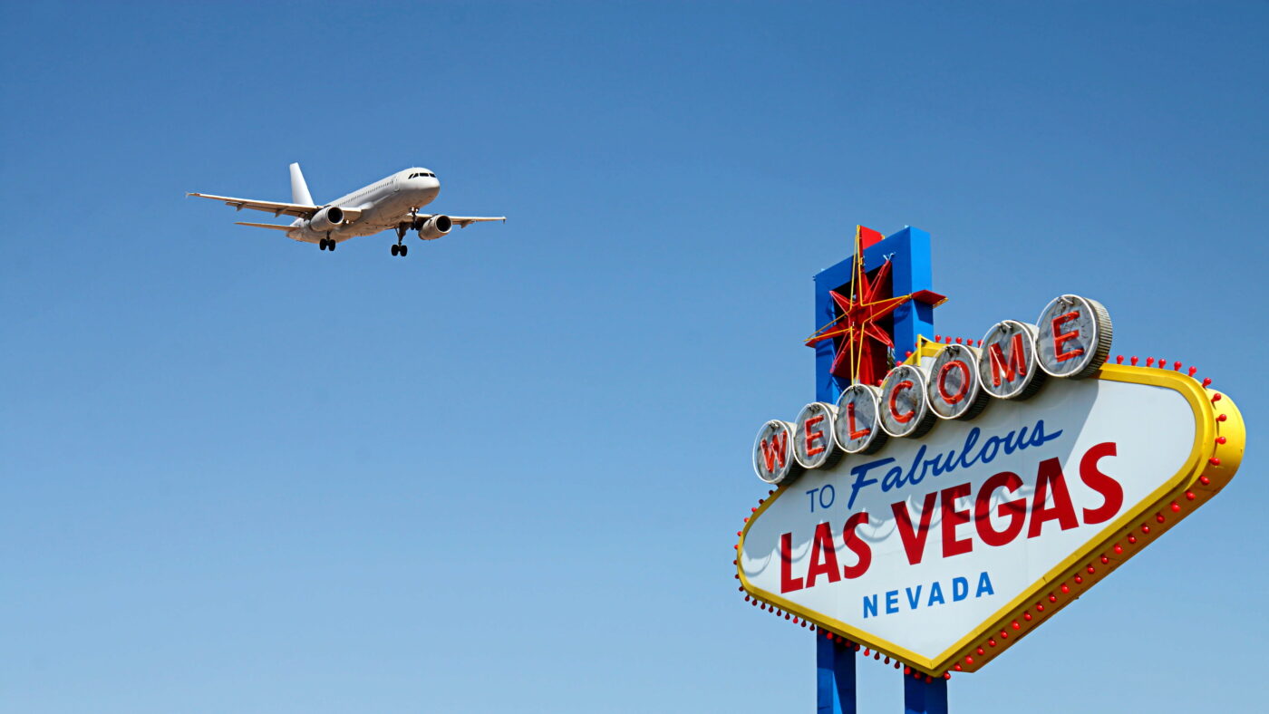 Welcome to Fabulous Las Vegas Sign with Arriving Airplane