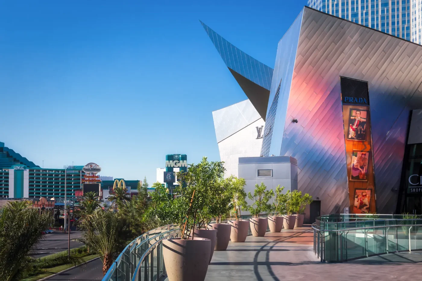 Shops at Crystals – A sleek, modern shopping center with angular metallic architecture and a view of the Las Vegas Strip.